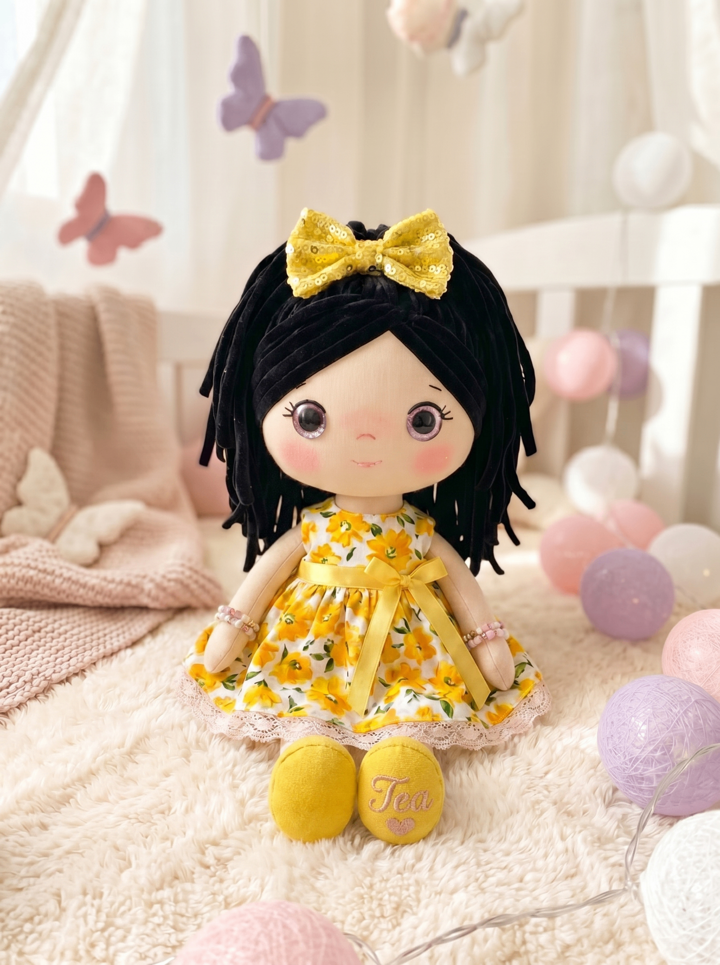 Sunshine doll with a personalized name embroidered on the shoe sole.