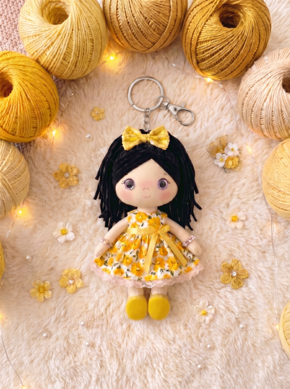Sunshine keychain with silver hardware and no personalization.