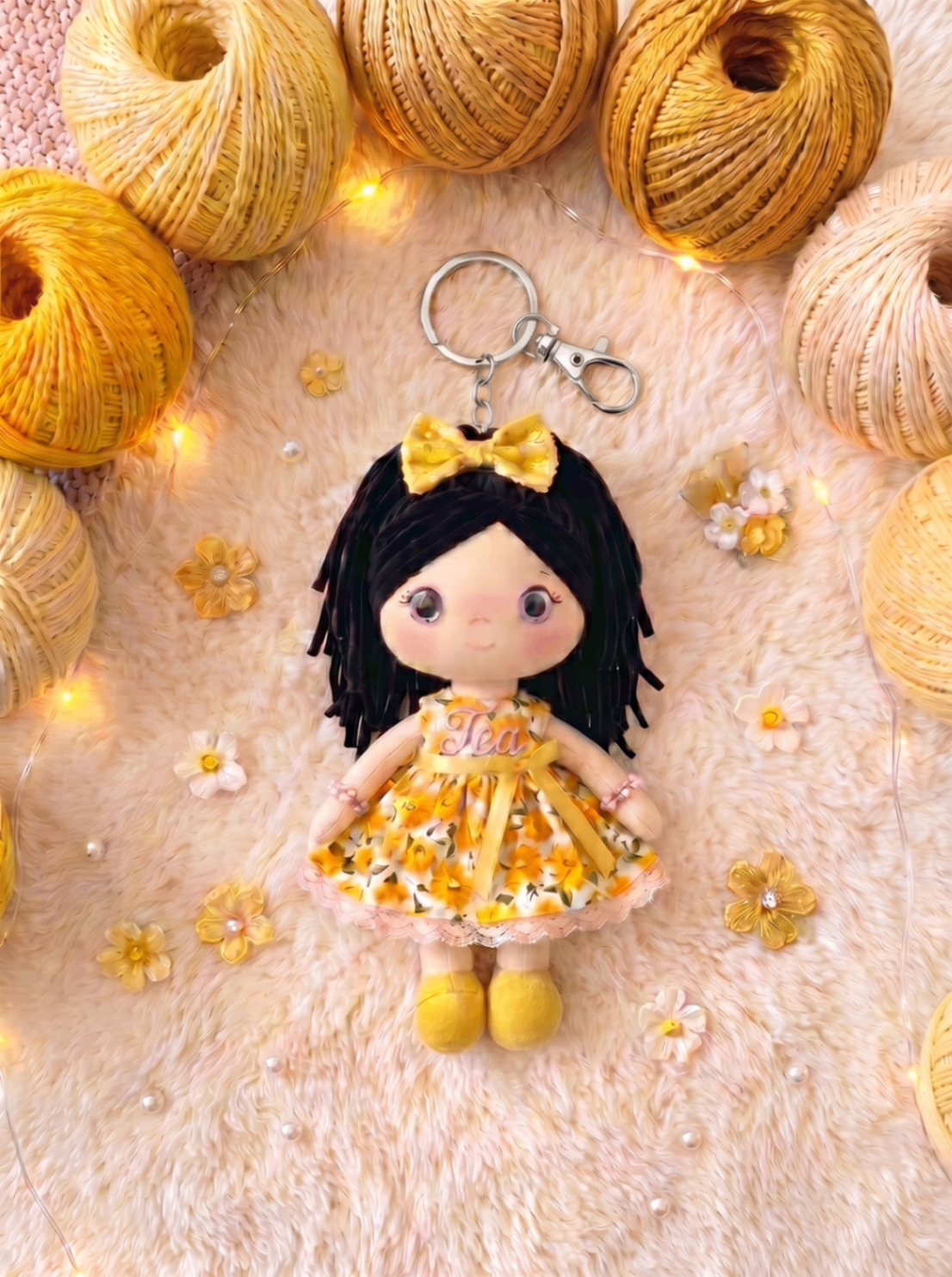 Sunshine keychain with silver hardware and personalization on the body.