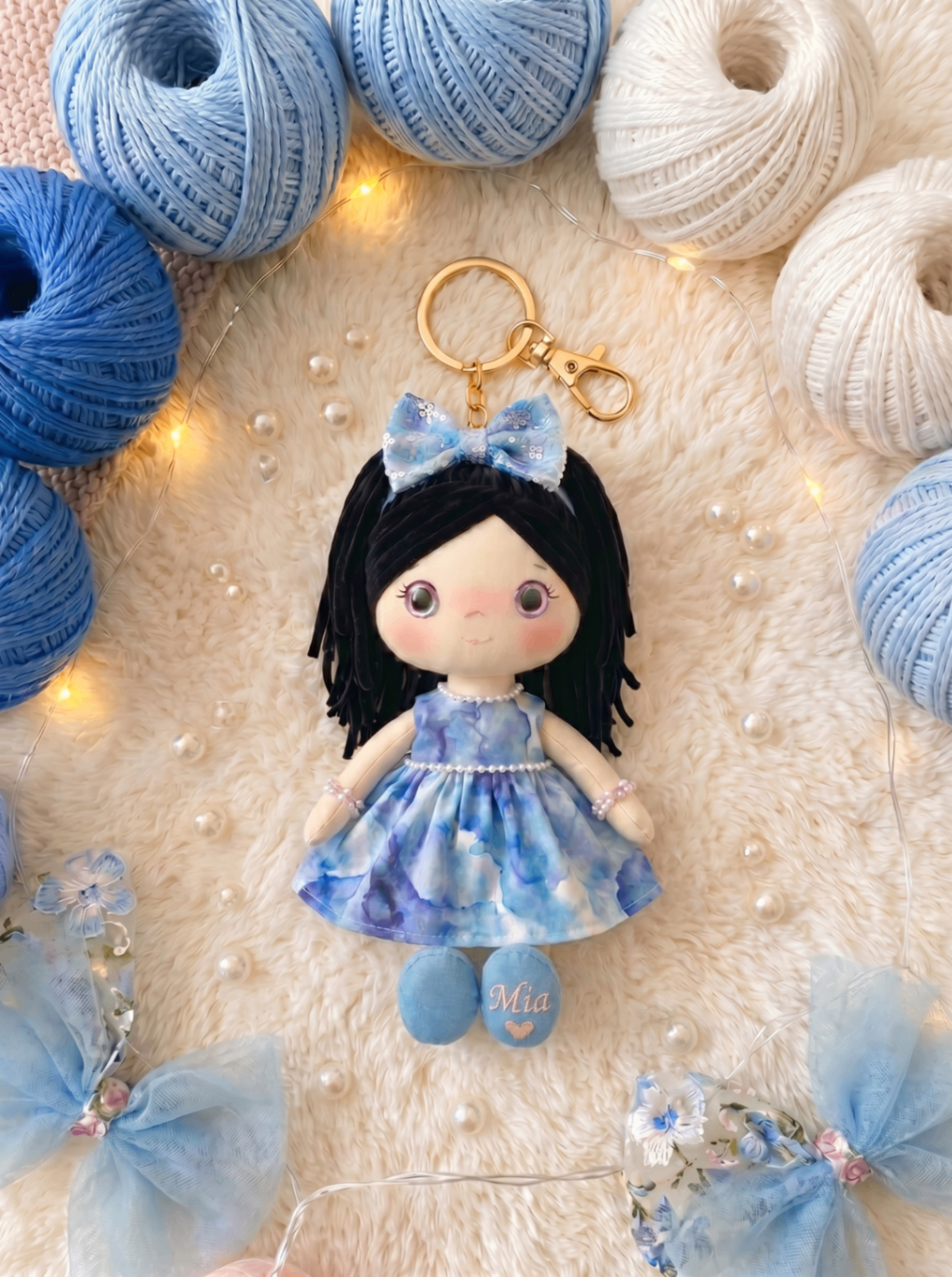Ocean Dream keychain with gold hardware and personalized embroidery on the sole.